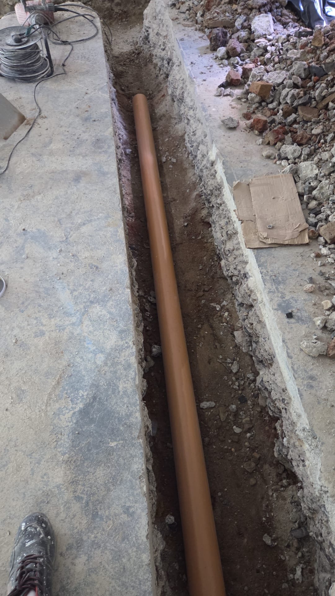 New drainage pipework laid in a trench